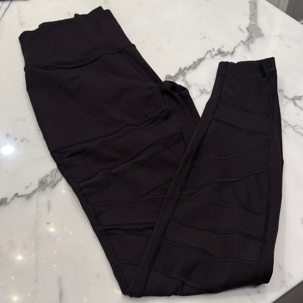 Lululemon black cut out mesh leggings size 4